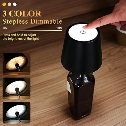 Cool white bottle top lamp on glass bottle, modern ambient LED light for bar counter and home decoration.